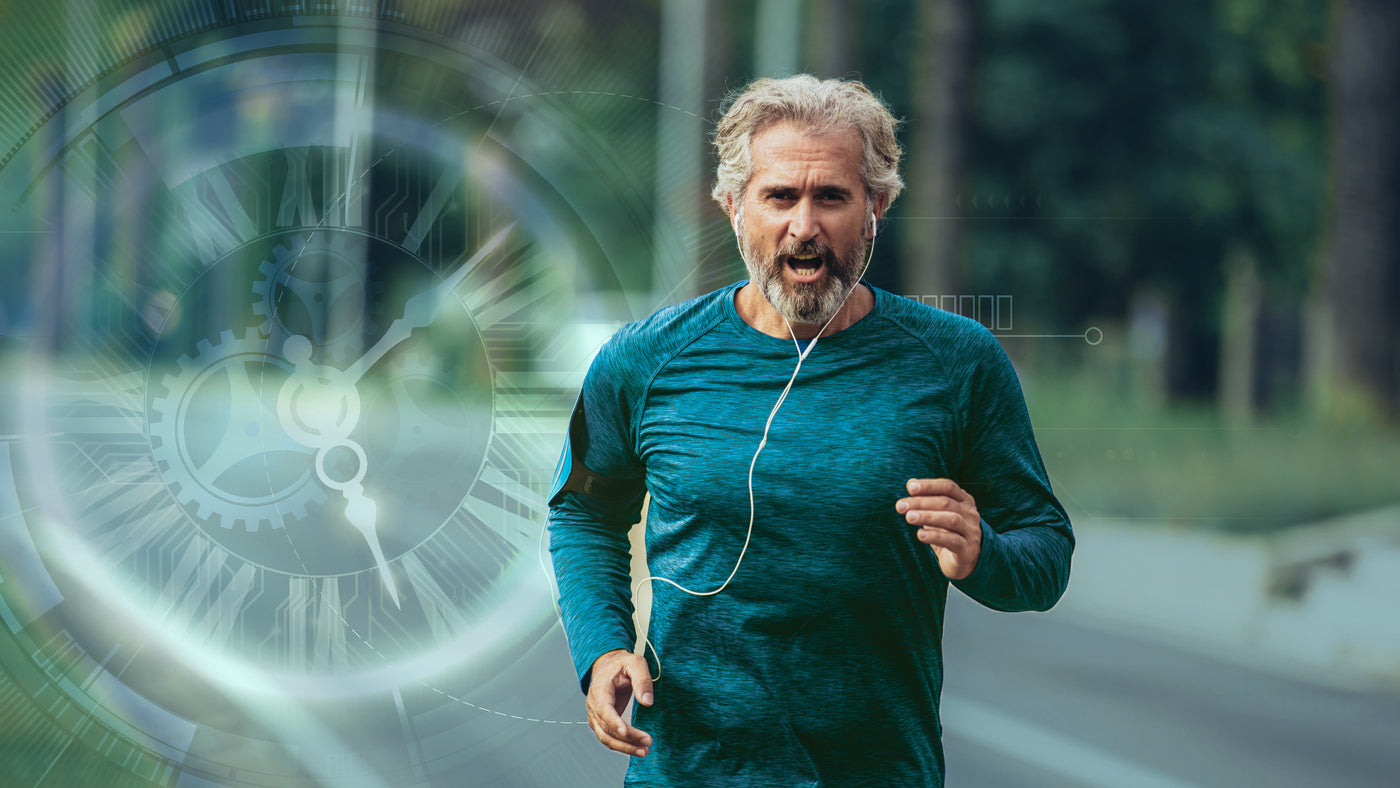 Mature man in good health jogging illustrating that his biological age is lower than his chronological age.